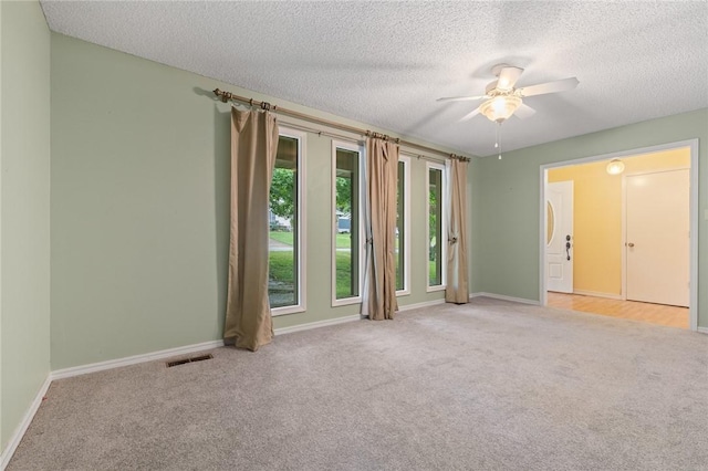 24 Meadow Lark Ln, Harrison, AR 72601 - spare room with carpet flooring, baseboards, a ceiling fan, and a textured ceiling