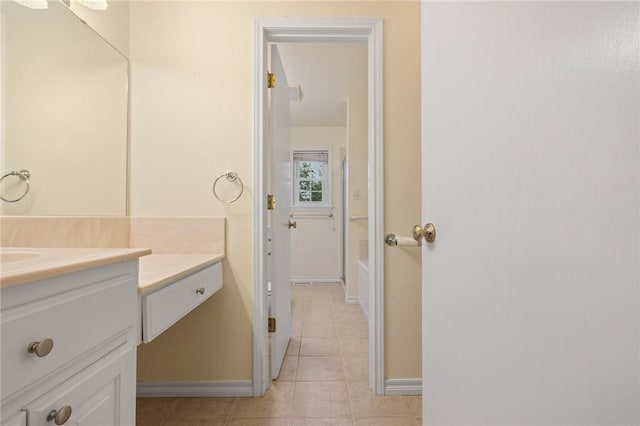 24 Meadow Lark Ln, Harrison, AR 72601 - bathroom featuring vanity, tile patterned flooring, and baseboards
