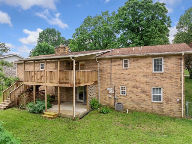 24 Meadow Lark Ln, Harrison, AR 72601 - rear view of house with a patio area, a chimney, a lawn, brick siding, and a deck
