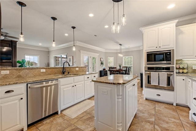 2314 S Mont Blanc Ave, Rogers, AR 72758 - kitchen with stainless steel appliances, a sink, backsplash, ornamental molding, and white cabinetry