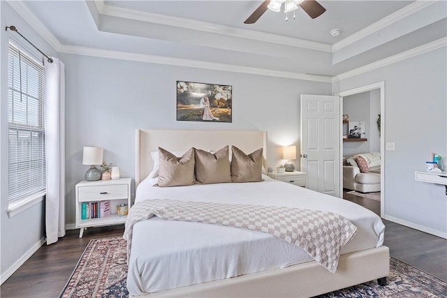 1031 Charles St, Pea Ridge, AR 72751 - bedroom featuring a raised ceiling, dark wood-type flooring, ornamental molding, baseboards, and ceiling fan