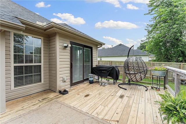 1031 Charles St, Pea Ridge, AR 72751 - wooden deck with a fenced backyard and area for grilling