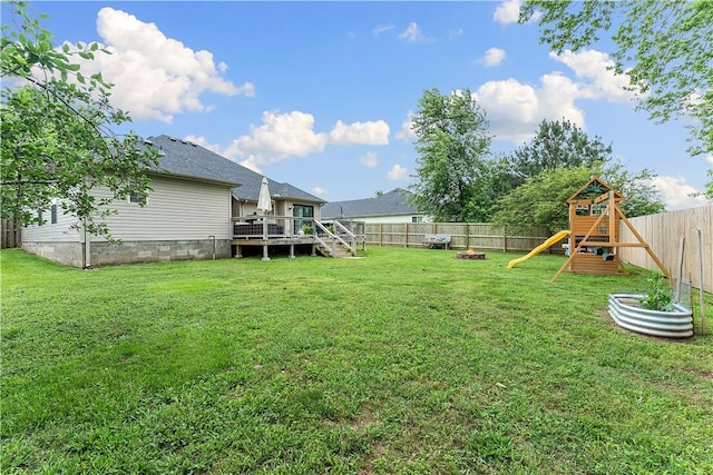 1031 Charles St, Pea Ridge, AR 72751 - view of yard with a wooden deck and a playground