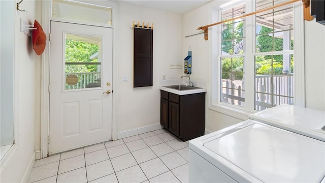14559 Zimmerman Ln, Rogers, AR 72756 - entryway featuring a sink, independent washer and dryer, light tile patterned floors, and baseboards