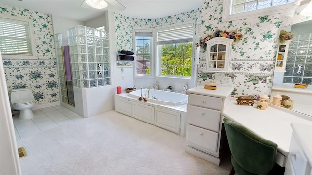 14559 Zimmerman Ln, Rogers, AR 72756 - full bathroom featuring wallpapered walls, toilet, a tub with jets, an enclosed shower, and tile patterned flooring