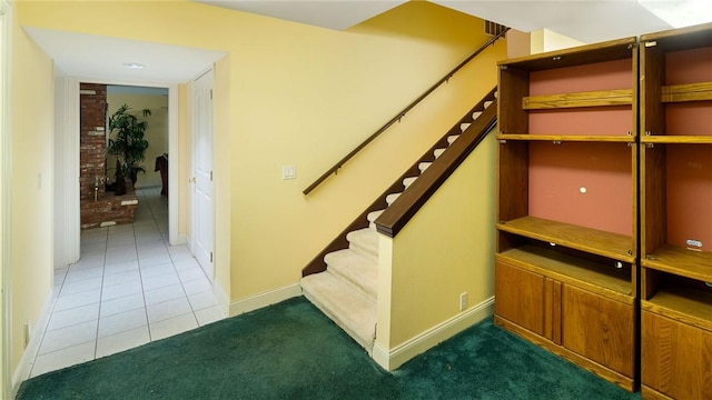 14559 Zimmerman Ln, Rogers, AR 72756 - stairs with tile patterned floors, baseboards, and carpet flooring