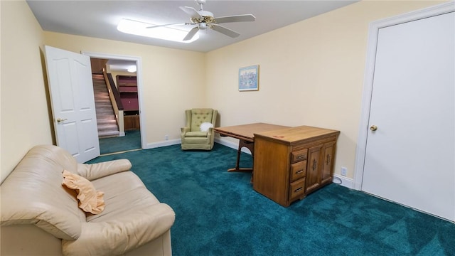 14559 Zimmerman Ln, Rogers, AR 72756 - office area featuring dark carpet, a ceiling fan, and baseboards