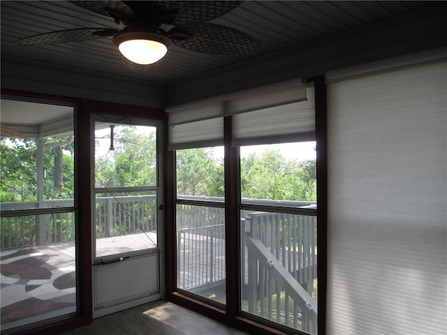 9 Rancho Vista Ln, Holiday Island, AR 72631 - unfurnished sunroom with healthy amount of natural light and a ceiling fan