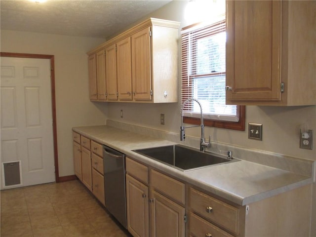9 Rancho Vista Ln, Holiday Island, AR 72631 - kitchen featuring dishwasher, light countertops, light brown cabinetry, and light tile patterned floors