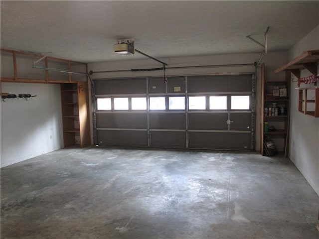 9 Rancho Vista Ln, Holiday Island, AR 72631 - garage featuring a garage door opener