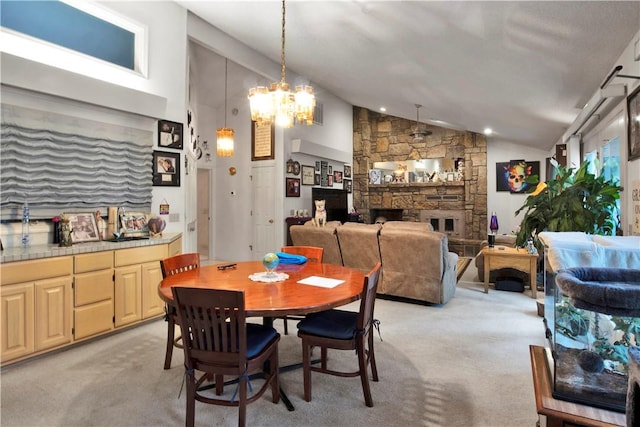 4 Branchwood Ln, Bella Vista, AR 72715 - dining room featuring vaulted ceiling, light carpet, a fireplace, and a chandelier