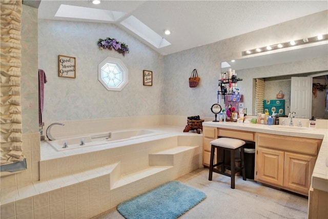 4 Branchwood Ln, Bella Vista, AR 72715 - bathroom featuring a skylight, vanity, a bath, vaulted ceiling, and wallpapered walls