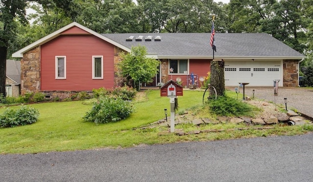 4 Branchwood Ln, Bella Vista, AR 72715 - view of front of property with an attached garage, a front yard, driveway, stone siding, and roof with shingles