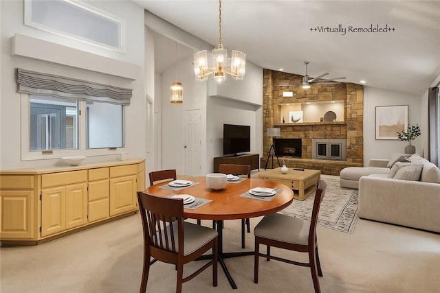 4 Branchwood Ln, Bella Vista, AR 72715 - dining room featuring lofted ceiling, ceiling fan, a stone fireplace, light colored carpet, and recessed lighting