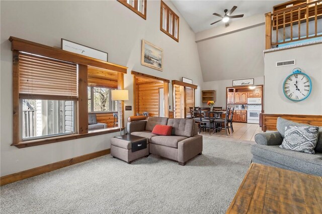 2480 N Saint Andrews Dr, Kansas, OK 74347 - living room with carpet floors, ceiling fan, high vaulted ceiling, and baseboards