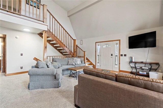 2480 N Saint Andrews Dr, Kansas, OK 74347 - living area featuring stairway, baseboards, carpet flooring, and high vaulted ceiling