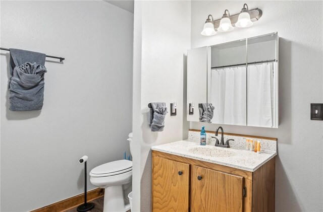 2480 N Saint Andrews Dr, Kansas, OK 74347 - full bathroom with toilet and vanity