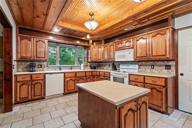 2480 N Saint Andrews Dr, Kansas, OK 74347 - kitchen featuring wooden ceiling, white appliances, brown cabinetry, and tasteful backsplash
