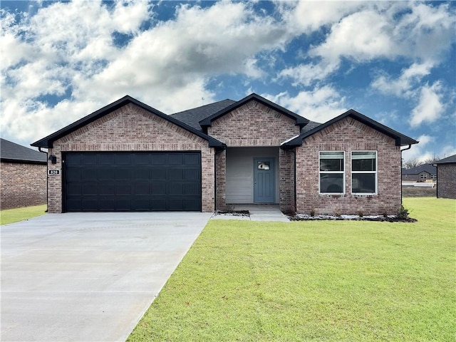 481 Maya St, Prairie Grove, AR 72753 - view of front of home with a garage, concrete driveway, a front yard, and brick siding