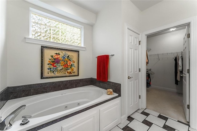 47 Rath Dr, Bella Vista, AR 72715 - full bathroom featuring a tub with jets and a spacious closet
