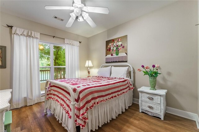 47 Rath Dr, Bella Vista, AR 72715 - bedroom featuring wood finished floors, access to exterior, baseboards, and ceiling fan