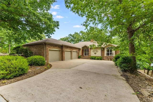 47 Rath Dr, Bella Vista, AR 72715 - ranch-style house with a garage, brick siding, concrete driveway, and a chimney