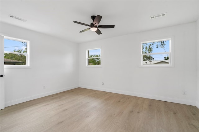 1089 Elway Dr, Springdale, AR 72764 - empty room featuring baseboards, light wood-style flooring, and a ceiling fan