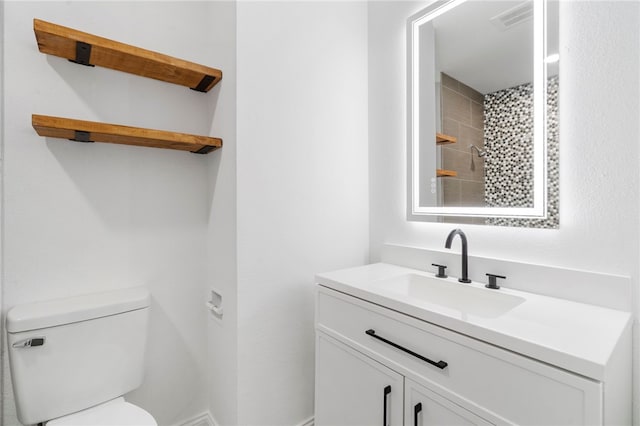 1089 Elway Dr, Springdale, AR 72764 - full bathroom with toilet, vanity, and a tile shower