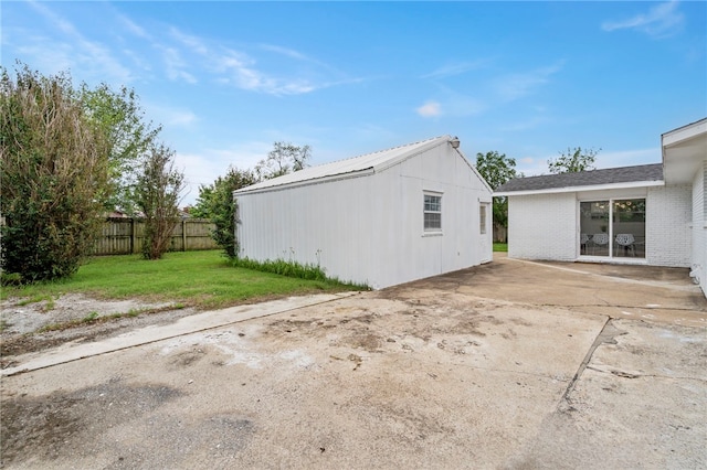 1089 Elway Dr, Springdale, AR 72764 - view of property exterior featuring brick siding and a patio