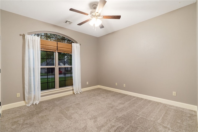 22704 Oakview Rd, Siloam Springs, AR 72761 - empty room with carpet, a ceiling fan, and baseboards