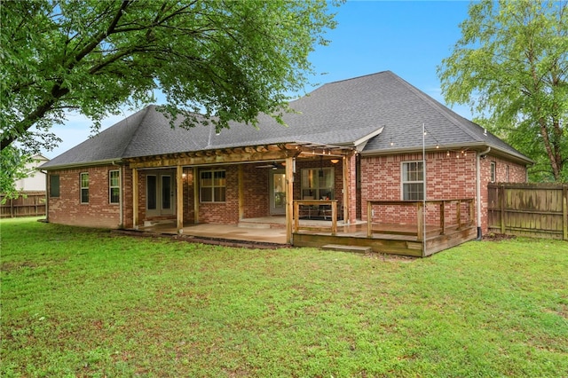 22704 Oakview Rd, Siloam Springs, AR 72761 - rear view of property with brick siding, roof with shingles, and a patio