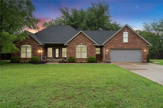 22704 Oakview Rd, Siloam Springs, AR 72761 - traditional home featuring driveway, brick siding, a garage, and roof with shingles