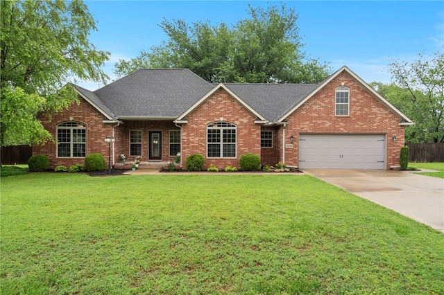 22704 Oakview Rd, Siloam Springs, AR 72761 - traditional-style home featuring concrete driveway, brick siding, and roof with shingles