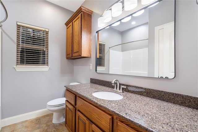 22704 Oakview Rd, Siloam Springs, AR 72761 - bathroom featuring toilet, a shower, vanity, and baseboards
