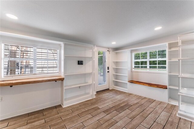 2182 Shumate, Springdale, AR 72762 - unfurnished room featuring wood finished floors and recessed lighting