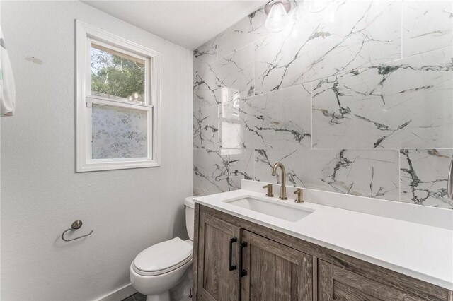 2182 Shumate, Springdale, AR 72762 - bathroom featuring vanity, toilet, and baseboards