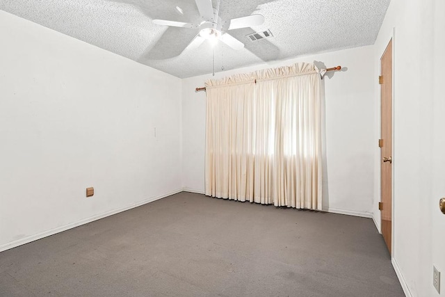 634 Orchard View Ests, Alma, AR 72921 - spare room featuring carpet floors, a textured ceiling, a ceiling fan, and baseboards