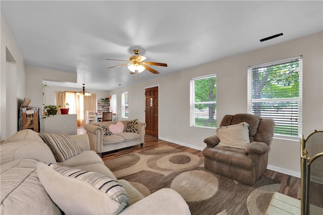 320 S Pleasant St, Springdale, AR 72764 - living room with baseboards, wood finished floors, and plenty of natural light
