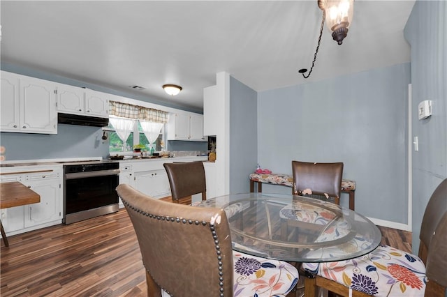 320 S Pleasant St, Springdale, AR 72764 - dining space featuring dark wood finished floors