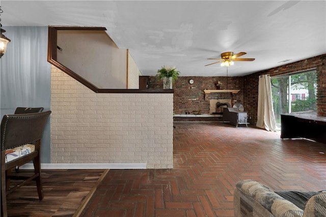 320 S Pleasant St, Springdale, AR 72764 - living area with brick wall and ceiling fan