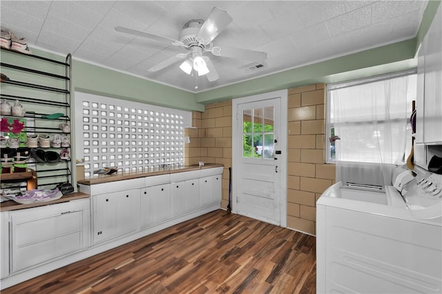 320 S Pleasant St, Springdale, AR 72764 - washroom featuring dark wood finished floors, ceiling fan, ornamental molding, and separate washer and dryer