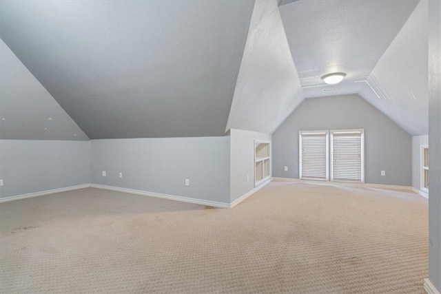 4204 Warbal Trl, Rogers, AR 72758 - bonus room with lofted ceiling, light colored carpet, and baseboards