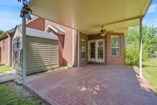 4204 Warbal Trl, Rogers, AR 72758 - view of patio featuring ceiling fan and a shed