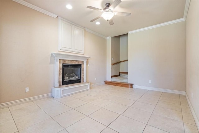 4204 Warbal Trl, Rogers, AR 72758 - unfurnished living room featuring a ceiling fan, crown molding, a tiled fireplace, recessed lighting, and light tile patterned floors