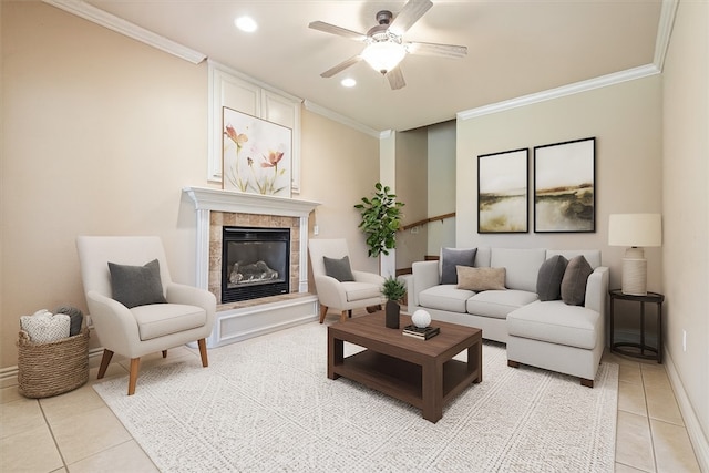 4204 Warbal Trl, Rogers, AR 72758 - living area with light tile patterned floors, ornamental molding, a tiled fireplace, a ceiling fan, and recessed lighting