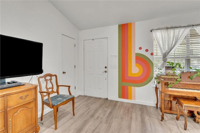 20640 Hillcrest Dr, Springdale, AR 72764 - living area with light wood-type flooring, vaulted ceiling, and baseboards