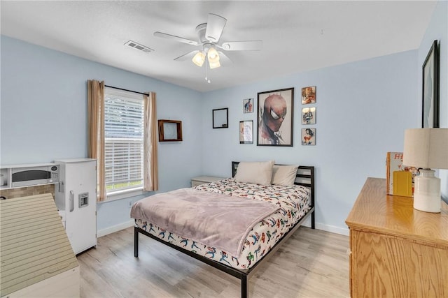 20640 Hillcrest Dr, Springdale, AR 72764 - bedroom with light wood finished floors, baseboards, and ceiling fan