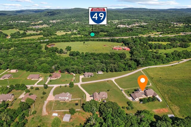 815 James Pl, West Fork, AR 72774 - aerial view of property and surrounding area featuring a heavily wooded area and mountains