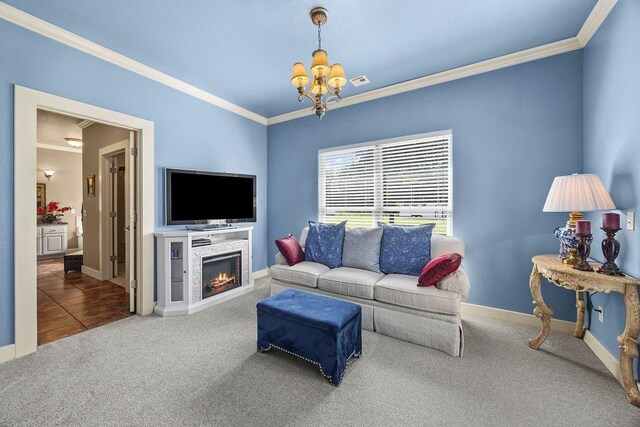 815 James Pl, West Fork, AR 72774 - living room featuring a chandelier, carpet flooring, crown molding, baseboards, and a warm lit fireplace