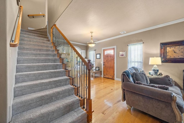 815 James Pl, West Fork, AR 72774 - staircase featuring ornamental molding, wood finished floors, and baseboards
